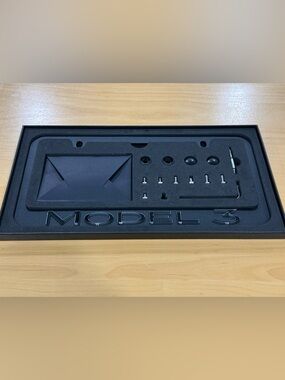 Black License Plate for Model 3 with accessories New missing 1 screw sold as is.